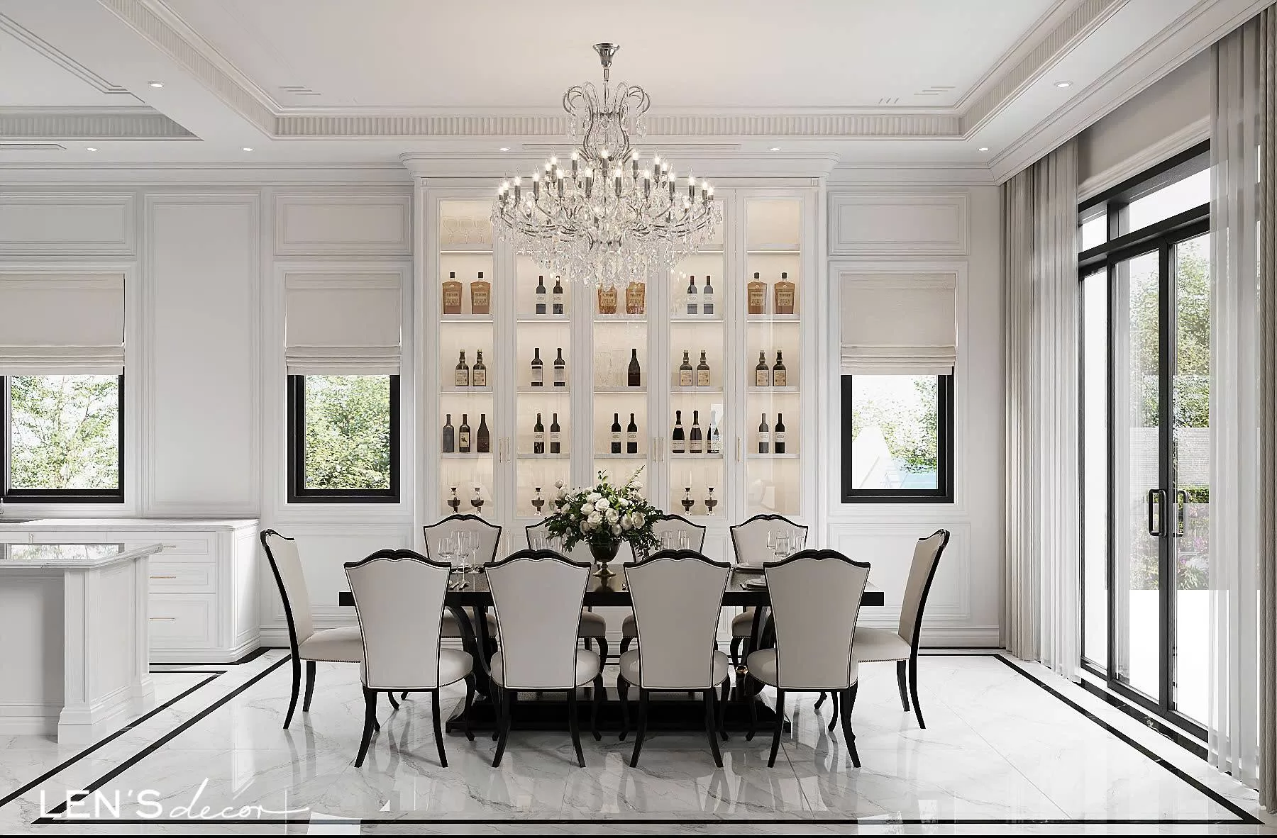 Bàn ăn dài bọc da trắng, khung gỗ đen, nằm ngay dưới đèn chùm pha lê tạo điểm nhấn lộng lẫy